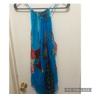 Blue peacock shirt with designs in the front and back